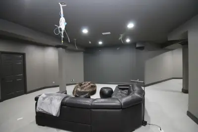 Modern Basement Cinema and Recreation Space — House Painting Services project by Parviz Painting MD LLC