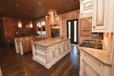 Elegant Cream Kitchen Cabinets with Glazed Finish — House Painting Services project by Hardy's Painting