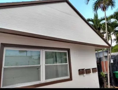 Elegant White Facade — House Painting Services project by Dehm Painting Service Corp