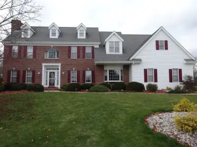 Tan and Red Trimmed Brick Houses — House Painting Services project by Two Day Painting LLC