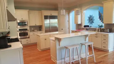 White Painted Cabinets — House Painting Services project by Wallscapers Kitchen & Bath Innovations