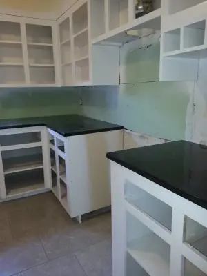Total Kitchen Cabinet Revamp — House Painting Services project by J.R Custom Finishes