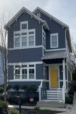 Multicolored Cottage Exterior Design — House Painting Services project by Painting & Moore