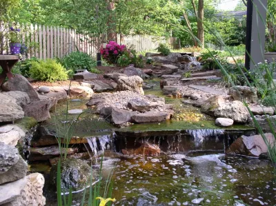 Before & After Waterfalls & Streams — Landscape Construction project by Good Earth Water Gardens