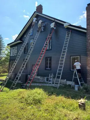 Transforming White Trim to Black in Exterior Painting — House Painting Services project by Ridge Painting Company