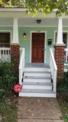 Kind Green Exterior Repainting — House Painting Services project by DeHaan Painting