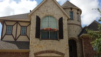 Rough Cedar Shutters with Exterior Stain by YourNextPainter
