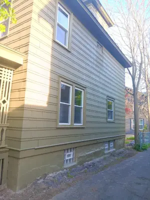 Exterior Wall Restoration: Repair, Sand, Scrape, and Paint — House Painting Services project by Falcon Master Painting LLC