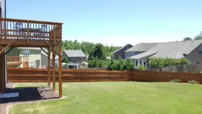 Fence Staining - Transformation Showcase — House Painting Services project by Painting Georgia Inc.