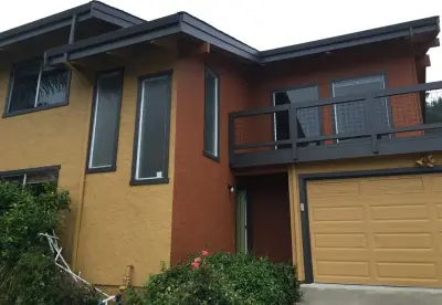 Vibrant Four-Color Facade — House Painting Services project by Transformational Color
