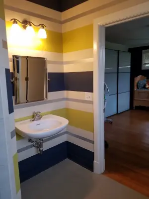 Playful Bathroom Stripes — House Painting Services project by S & S Painting