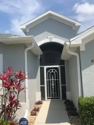 Charcoal Exterior Paint with Light Trim — House Painting Services project by Masterpiece Painting And Cabinetry LLC