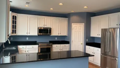 Highlands Ranch Interior Painting - Cabinets and Kitchen/Living Area — House Painting Services project by Kind Home Solutions