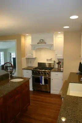 Two-Tier Island in a White Kitchen — Design-Build Services project by Zalewski Associates Inc.