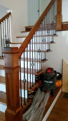 Forged Iron Stair Railing — Design-Build Services project by Johnston Remodeling