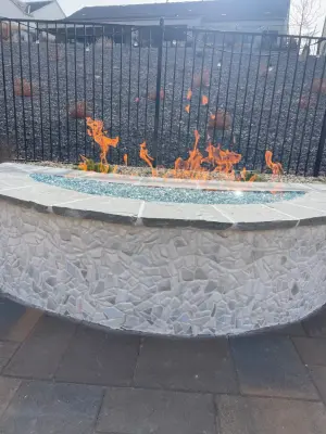 Creating the Ideal Outdoor Atmosphere: Unveiling Our Tailored Fire Pit Design — Landscape Construction project by Jefe's Landscaping
