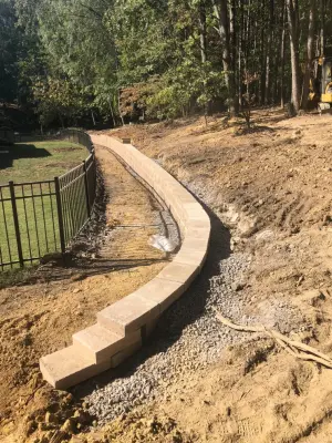Baneberry Barrier Wall — Landscape Construction project by Rhino Excavation