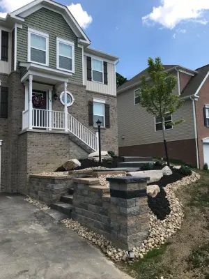 Stunning Stamped Concrete and Retaining Wall Transformation by Schellhaas Landscape Construction