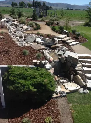 Country Stream — Landscape Construction project by Kimberly Nurseries Landscaping & Irrigation