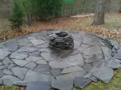 Charcoal Fire Pit and Seating Space — Landscape Construction project by 2 J's & Sons