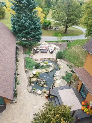 Twin Pond with Isle — Landscape Construction project by Shaylor's Ponds & Patios