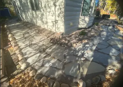 Lake Fish Flagstone - Duluth, MN — Landscape Construction project by CHS Superior Landscaping