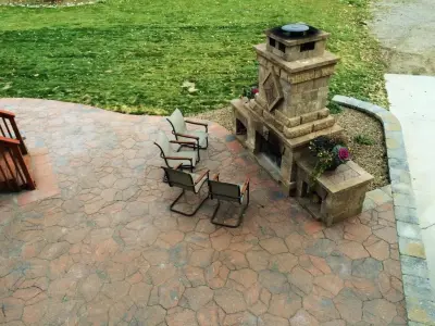 Personalized Paver Patio with Fireplace — Landscape Construction project by Norlen Landscaping, LLC