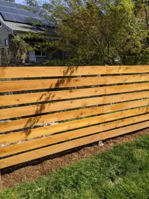 Cedar Fence in a Horizontal Design — Landscape Construction project by All Seasons Landscaping Of Mason County LLC
