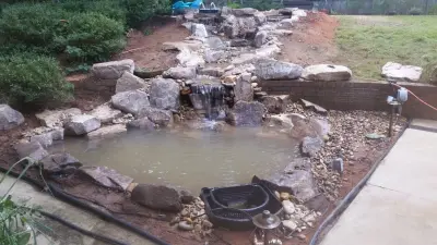 Aiken SC Waterfall and Stream Koi Pond — Landscape Construction project by McCormick Landscaping / Aquatic Solutions
