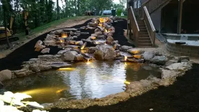 Layered Patio with Koi Pond and Water Features — Landscape Construction project by McCormick Landscaping / Aquatic Solutions