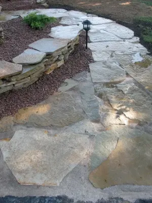Organic Rock — Landscape Construction project by Yoder Lawn
