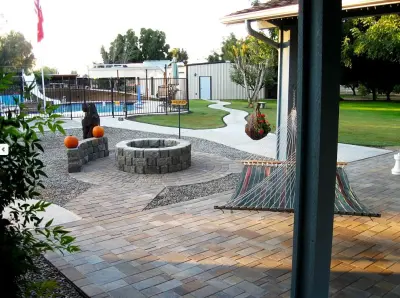 Clovis Outdoor Lounge and Firepit — Landscape Construction project by R Lacy Interlocking Pavers