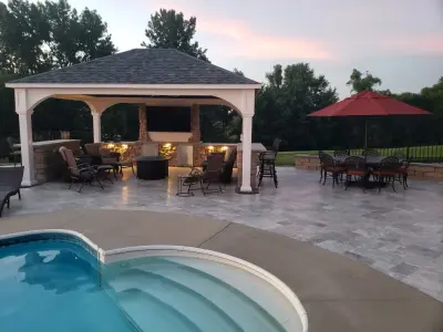 Exterior Spaces, Synthetic Grass, and Illuminated Trees — Landscape Construction project by Outdoor Innovations
