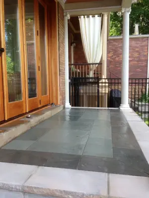 Limestone Trimmed Quartz Paver Stoop Overlay — Landscape Construction project by Wichman Landscape & Construction