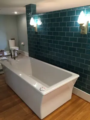 Primary Bedroom and Bathroom Suite — Home Renovation & Remodeling Services project by Duell Construction
