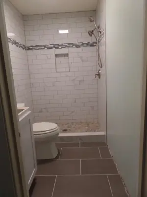 Meadow Way Hall Restroom — Home Renovation & Remodeling Services project by Before And After Builders, Inc.
