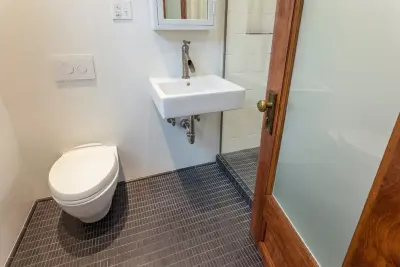 Bathroom on the Upper Level of Mexican War Streets — Home Renovation & Remodeling Services project by J. Francis Company LLC