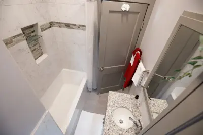Minneapolis Compact Full Bathroom — Home Renovation & Remodeling Services project by Zinran Construction Services Inc.