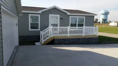 Wayne's Mobile Home Service - Roofing & Gutter Services in Des Moines, IA