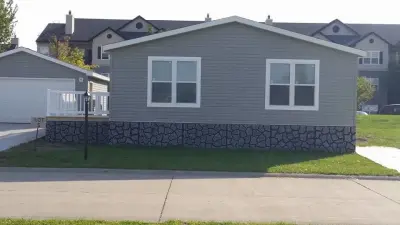 Wayne's Mobile Home Service - Roofing & Gutter Services in Des Moines, IA