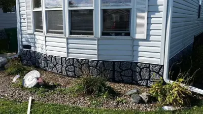 Wayne's Mobile Home Service - Roofing & Gutter Services in Des Moines, IA
