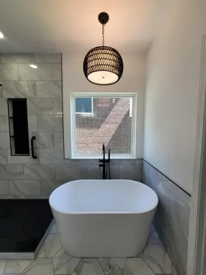 Modern Standalone Tub Bathroom Renovation — Home Renovation & Remodeling Services project by JMH Custom Builders