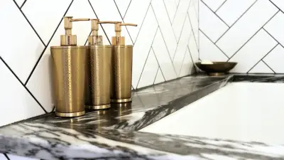 Contemporary Geometric Luxe Bath — Home Renovation & Remodeling Services project by Mint Construction