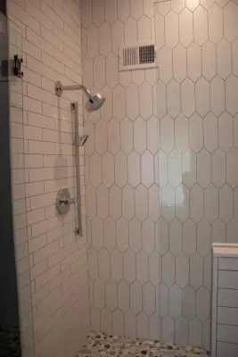 Navy Wall in the Master Bathroom — Home Renovation & Remodeling Services project by Bryan Casey Construction LLC