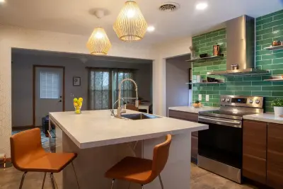 Contemporary Waterfall Kitchen — Home Renovation & Remodeling Services project by Miracle Contracting Inc.