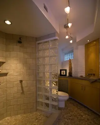 Basement Bathroom on Monument Avenue — Home Renovation & Remodeling Services project by Cabinetry & Construction, Inc.