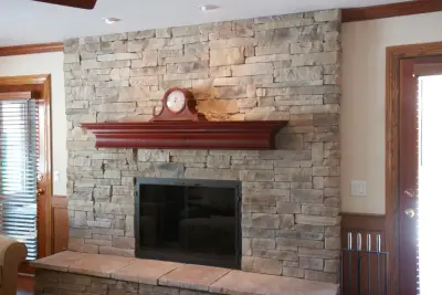 Stone Veneer Fireplaces with Mountain Stack Design — Home Renovation & Remodeling Services project by HX Home Solutions And North Star Stone