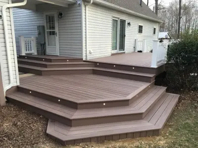 Layered PVC Deck — Home Renovation & Remodeling Services project by Badin Lake Builders