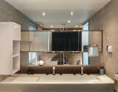 Earthy Brown Bath Space — Home Renovation & Remodeling Services project by Kitchen Master Design & Remodeling LLC