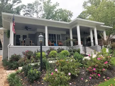 Updated Front Porch and Roof with House Painting and Window Sash Enhancements — Home Renovation & Remodeling Services project by Green House Renovation Atlanta, LLC
